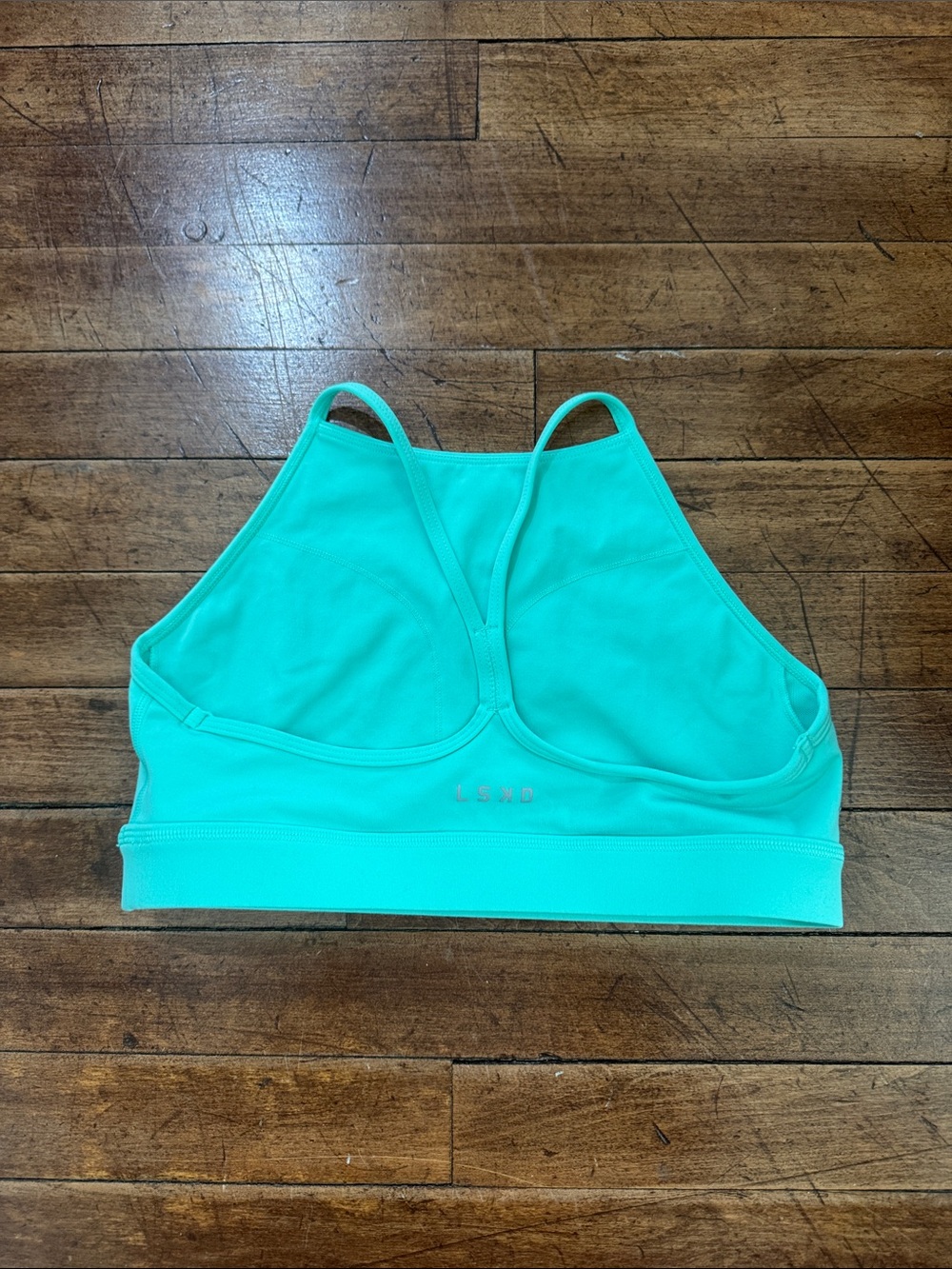 High-Neck Sports Bra in Turquoise with Racerback Straps, hardly worn